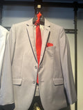 Light gray men's two-button suit with red tie and pocket square