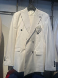 White double-breasted men's suit with peak lapels